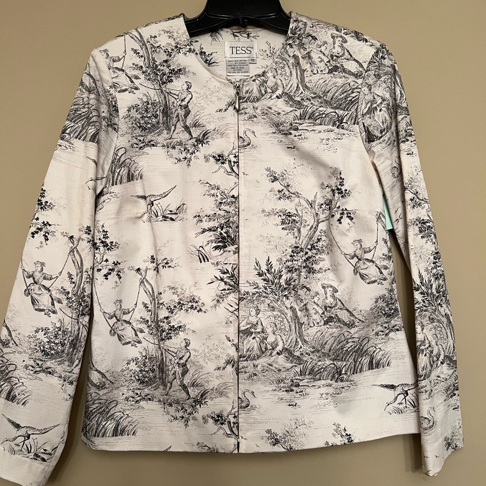 TESS womens zip up jacket. White with black print.
